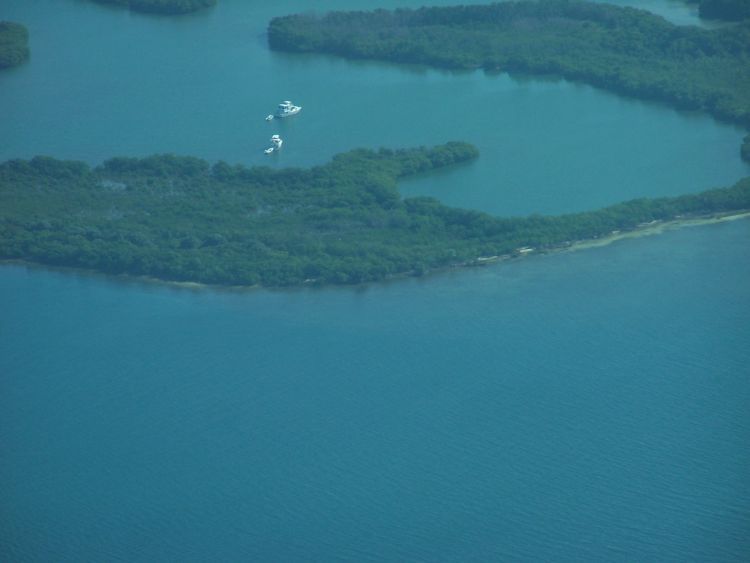 Boats Offshore a Cay