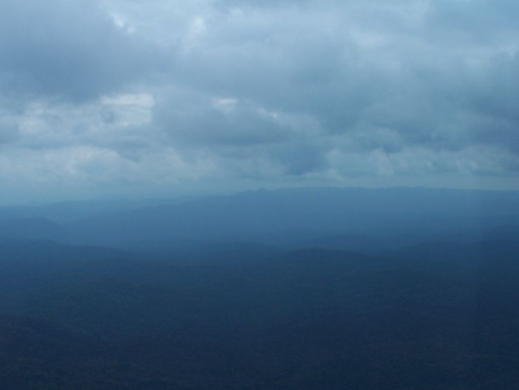 Helicopter — Clouds and Mountains