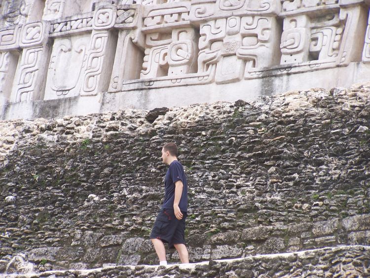 Xunantunich — Antoine Climbs Below the Frieze