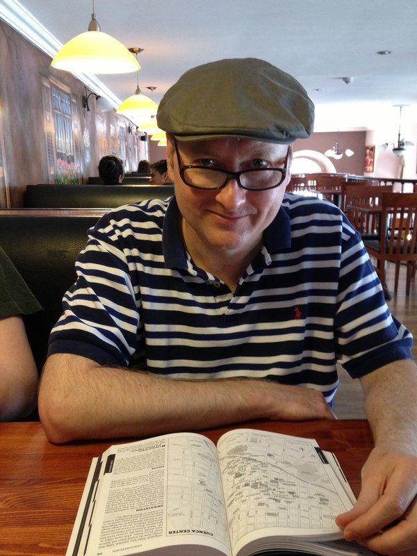 Ken with a Guidebook