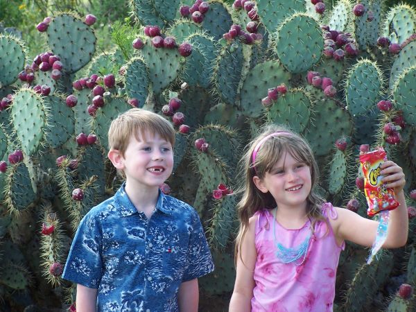 Matthew and Friend Sara in front a large prickly pear cactus