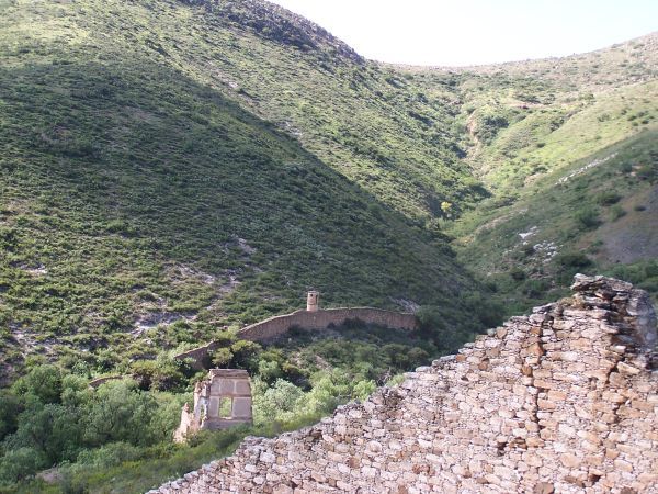 Old stone wall that protected Pozos