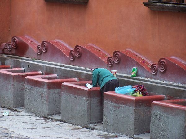 Closeup of Woman Washing Clothes